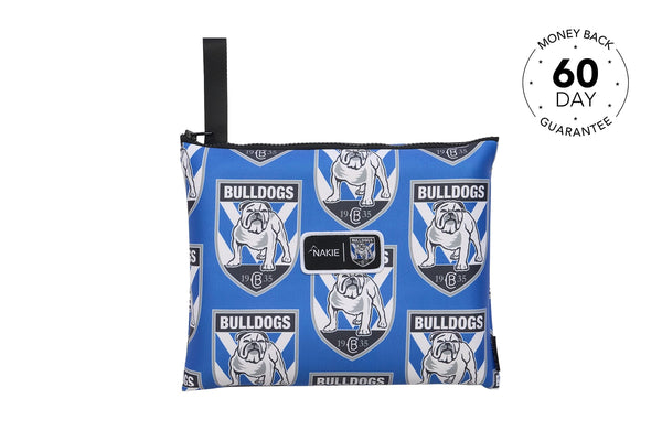 Blue Bulldogs beach towel with repeated bulldog logo and shield pattern, black carrying handle, Nakie label visible.