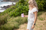 Dusty pink insulated coffee cup with lid held by woman outdoors near beach preview #7