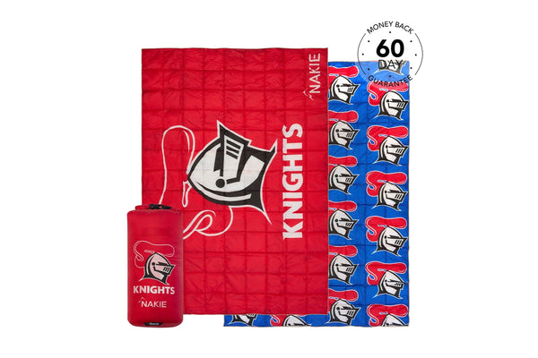 Red and blue quilted Knights NRL blanket with matching carry pouch, reversible design with team logo and player graphics.