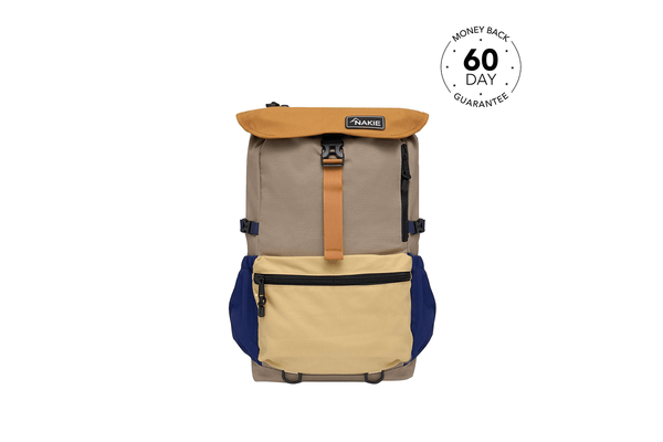 Taupe and cream colorblock rolltop backpack with tan flap, orange center strap, and navy side pockets, front view.