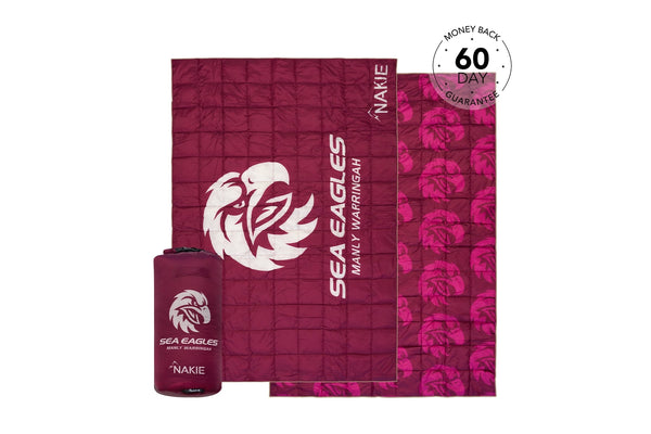Maroon quilted puffy blanket with Sea Eagles logo, shown unfolded with matching compression bag and branded stuff sack.