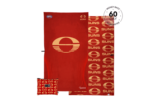 Gold Coast SUNS AFL beach towel in red with gold logo and repeating SUNS pattern, displayed flat with matching small pouch.