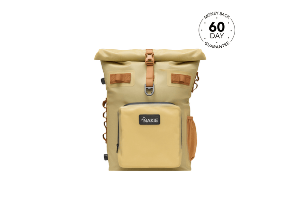 Sahara Sand recycled cooler backpack with tan fabric, tan leather accents, front pocket, and roll-top closure.