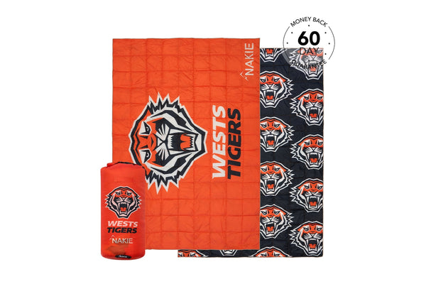 Wests Tigers red puffy blanket with tiger head logo and repeating tiger motif on black reverse