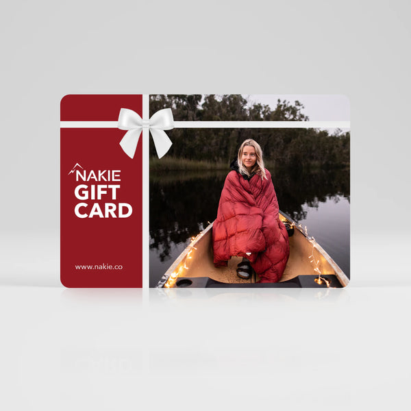 Nakie Gift Card with a woman in a boat on a river